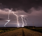 Lightning and farm road - Paxton, Nebraska