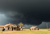 Wall cloud over old farmhouse - east of Plainview, Texas
