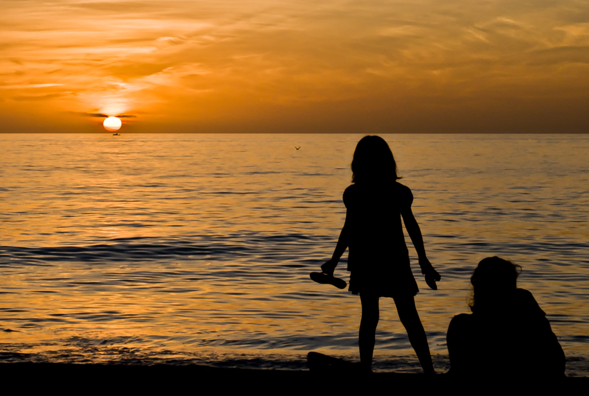 Girl on beach at sunset - Captiva Island, Florida