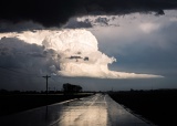 Thunderstorm reflected by wet road - Broadwater, Nebraska
