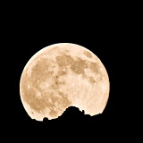 Moonrise over cliff - Death Valley National Park, California