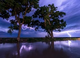 Lightning reflected by the Fort Lyon Canal - Lamar, Colorado